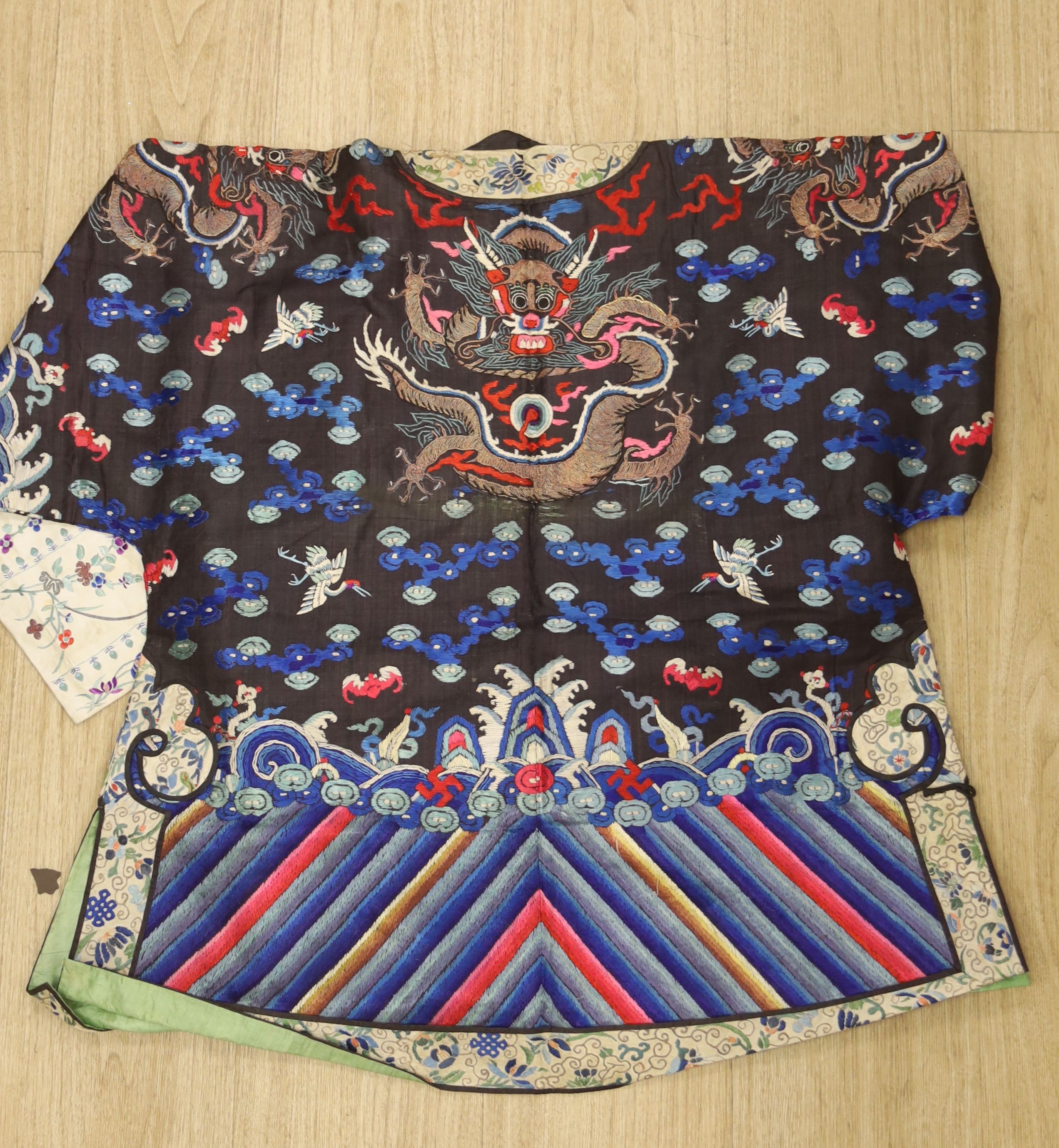 An early 20th century Chinese dragon embroidered silk robe, length 71cm